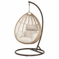 Chaise suspendue rotin synthétique avec coussins beiges