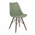 Chaise en plastique vert avec pieds en bois et métal