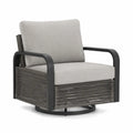 Fauteuil pivotant en aluminium et rotin, coussins en tissu gris