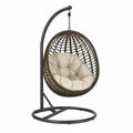 Chaise suspendue en résine tressée brun et coussin beige pour extérieur